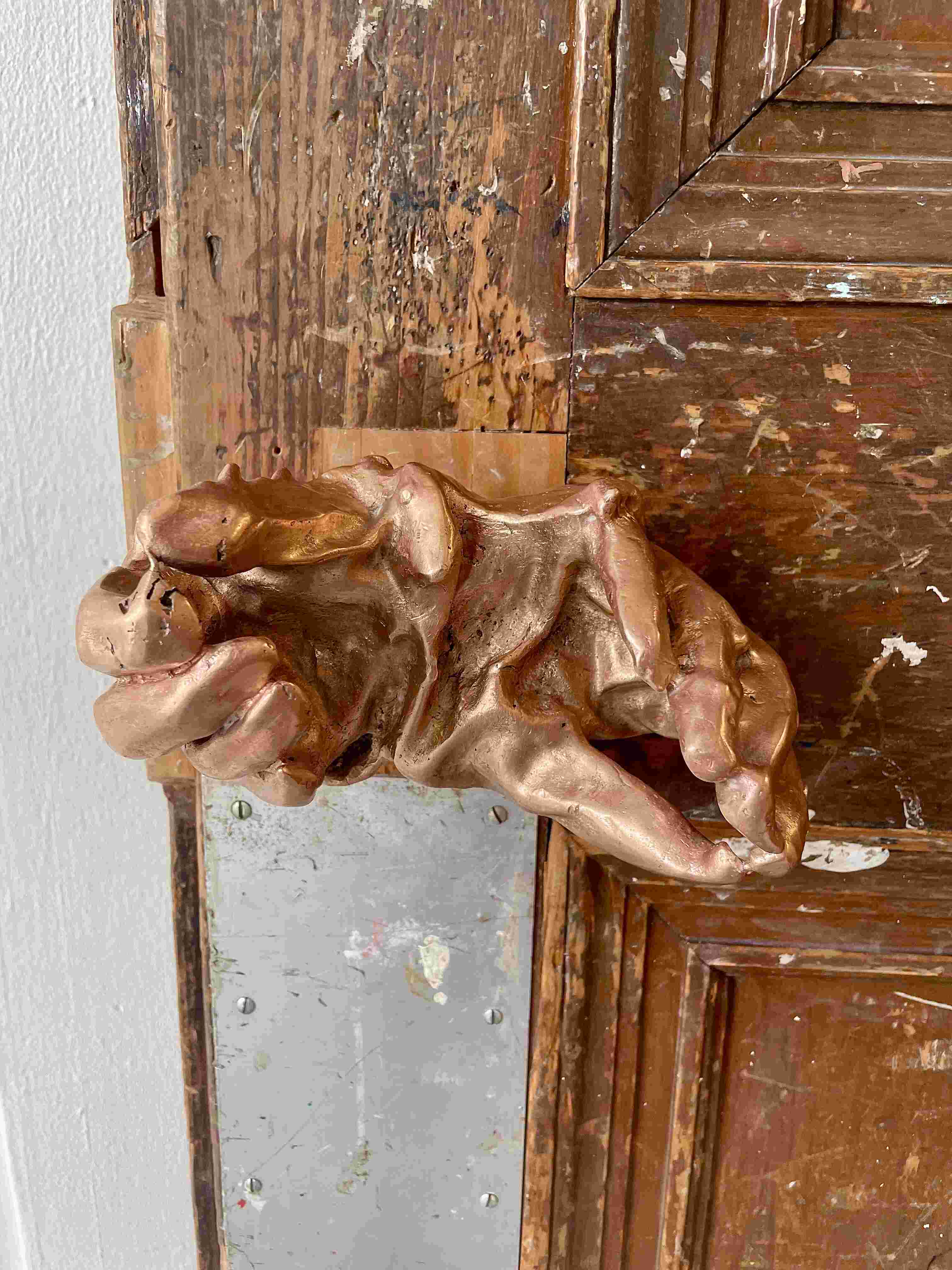 Bronze distorted hand door handle 