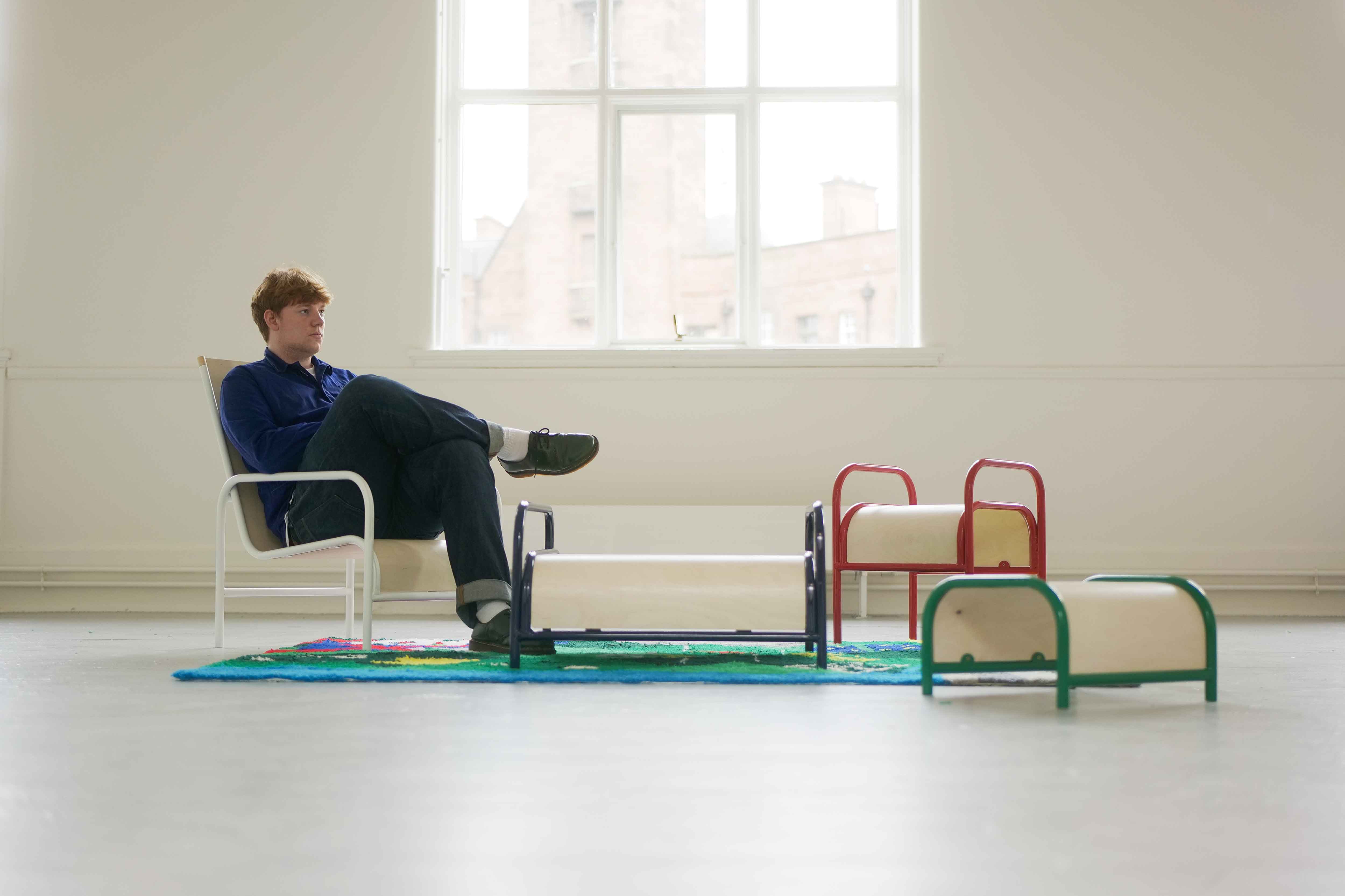 George Duggan sitting on the England Chair