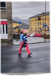 big headed person walking