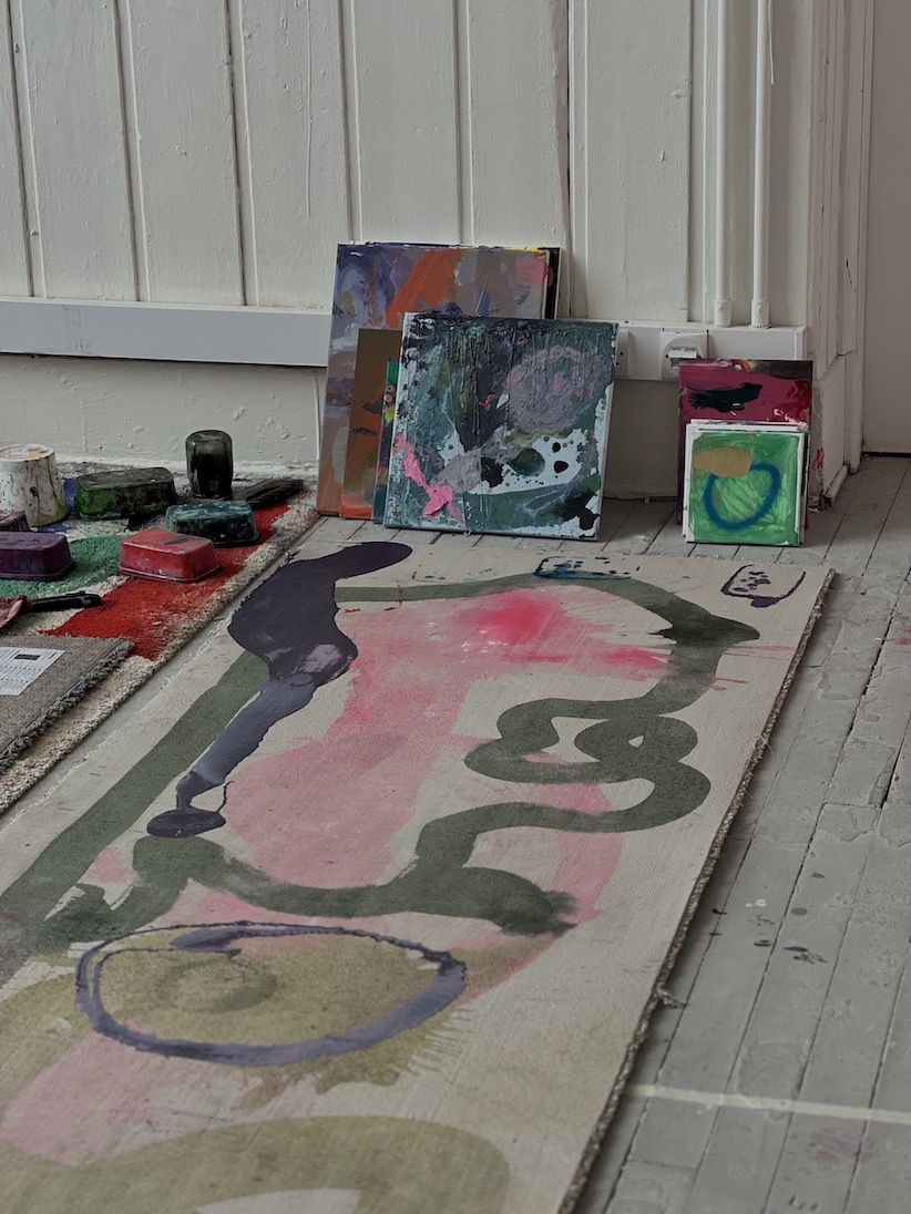 STUDIO IN PROGRESS, RUGS AND CANVAS DRYING.