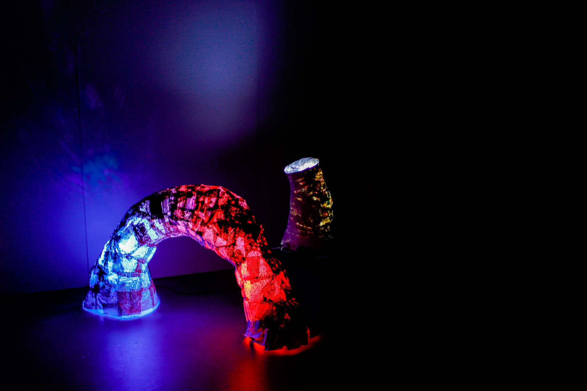 set of two wire and paper mache sculptures. Light from within with LED stage lighting.