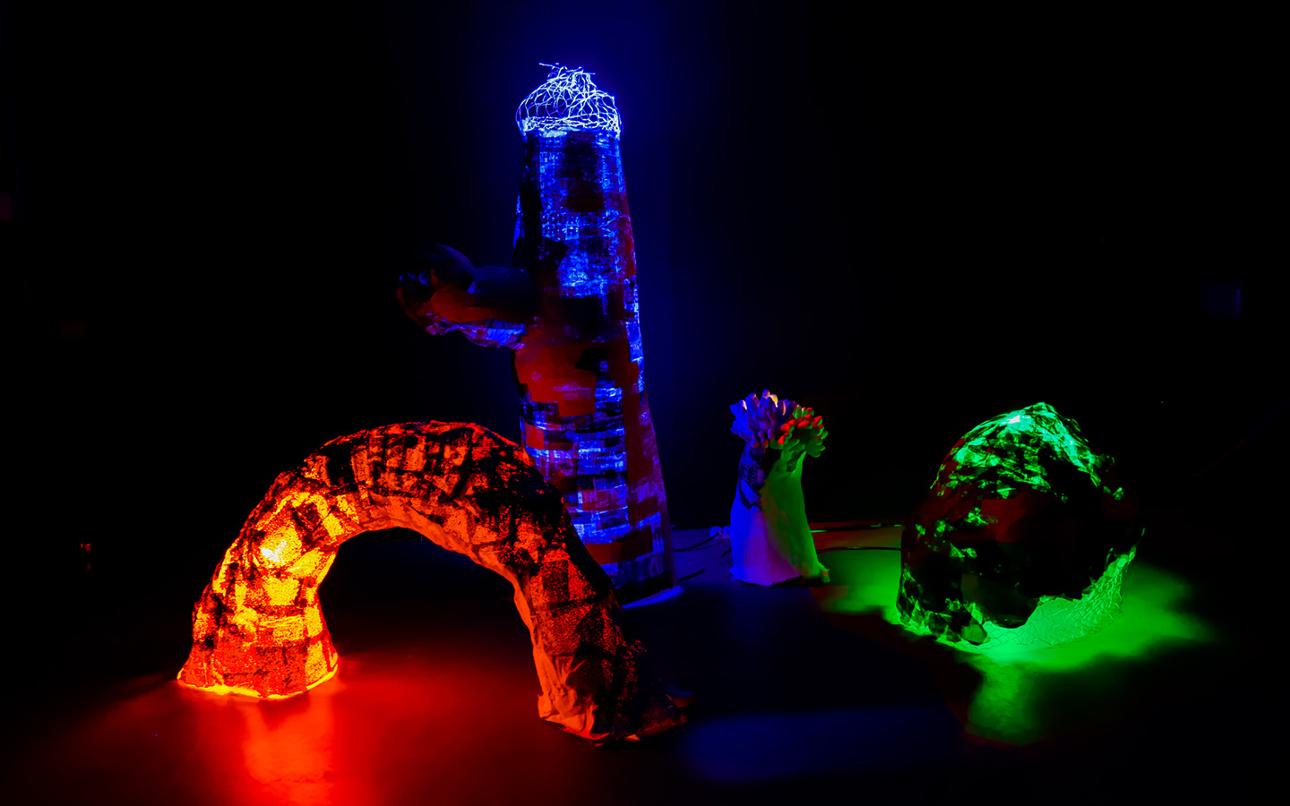 set of four wire, plaster and paper maché. Lit from within with LED stage lights - red, blue and green.