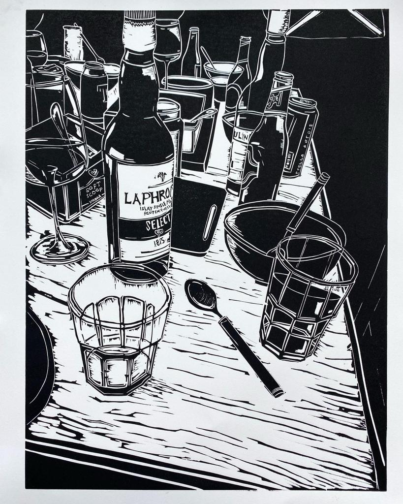 Bottles and glasses sit on a table after a Burn's Night supper 