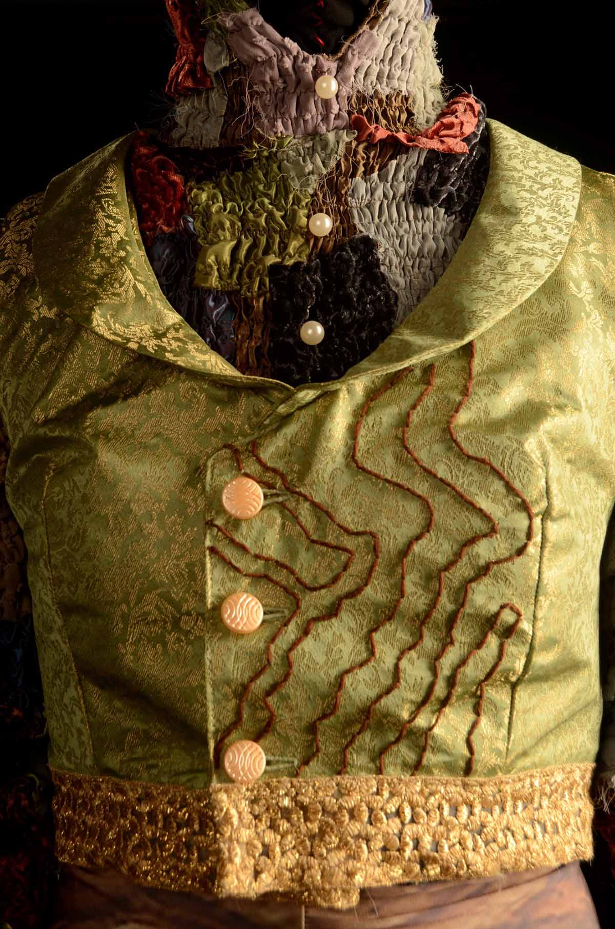 A close up of the costume for a characterisation of Dorian's Portrait from The Picture of Dorian Gray by Oscar Wilde.