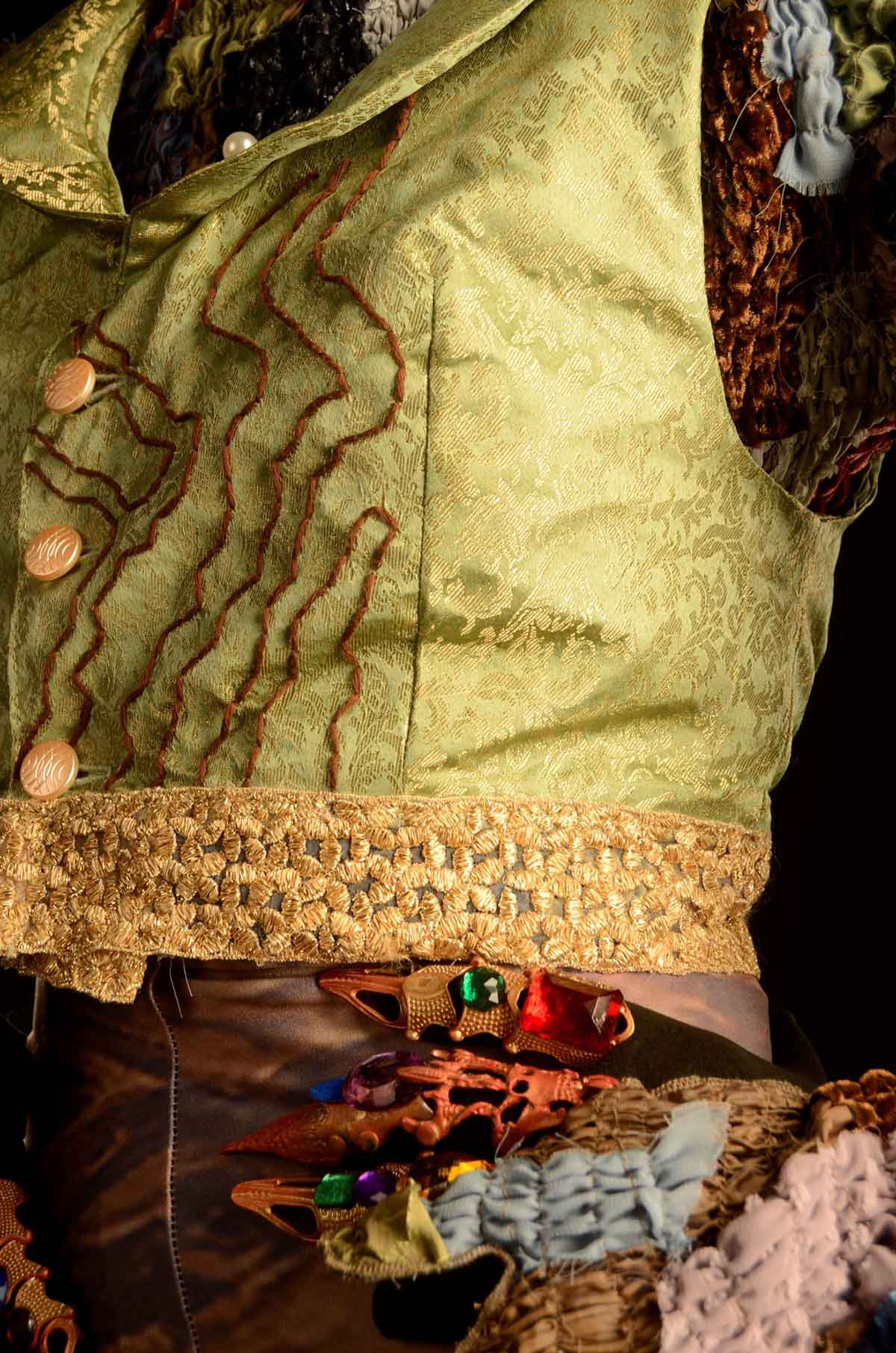 A close up of the costume for a characterisation of Dorian's Portrait from The Picture of Dorian Gray by Oscar Wilde.