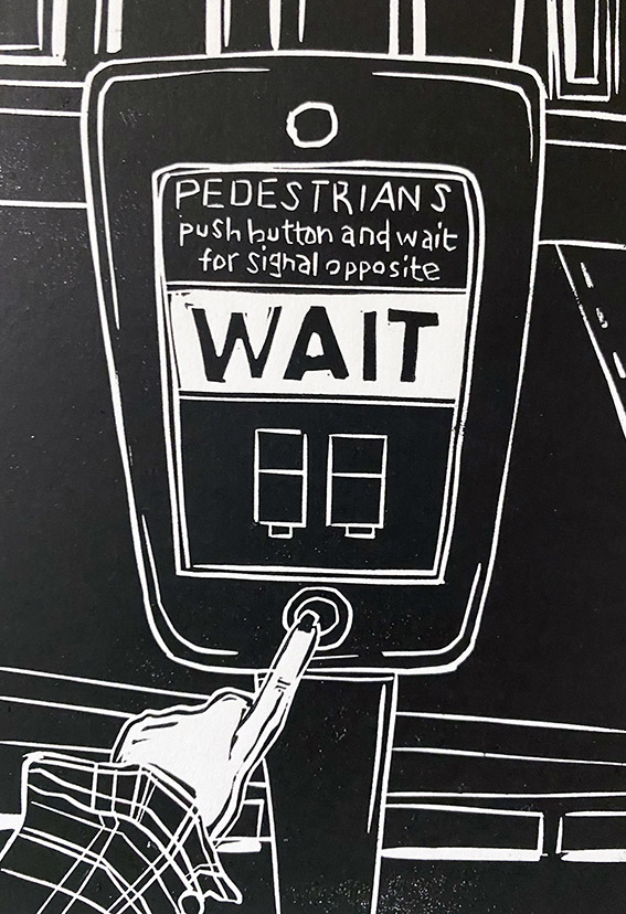 A hand presses the button at a pedestrian crossing, which reads 'WAIT'