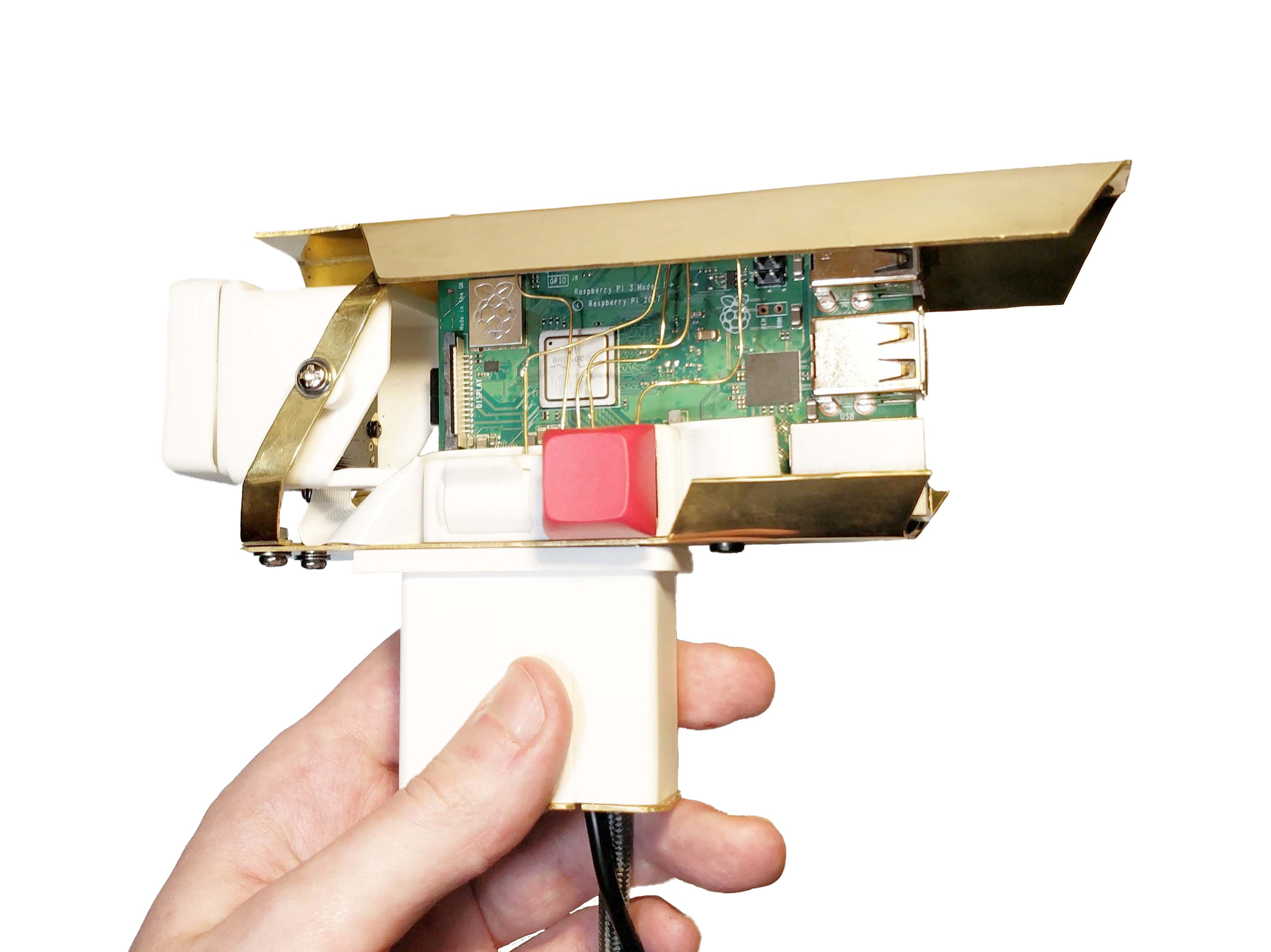 Mind's Eye camera in a hand