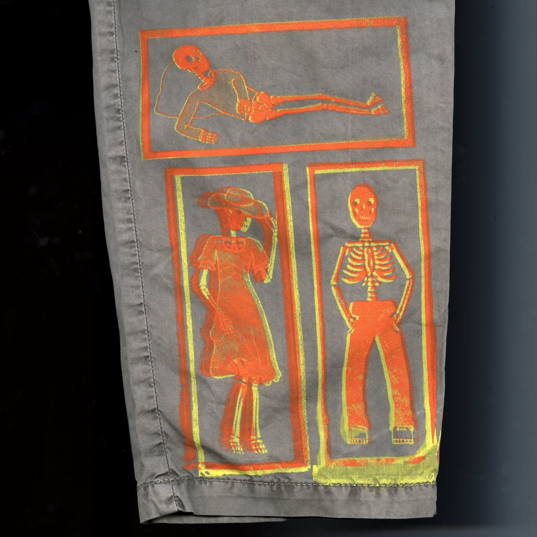 orange skeleton trouser detail