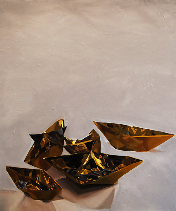 Image of paper boats made of golden blanket in a grey landscape