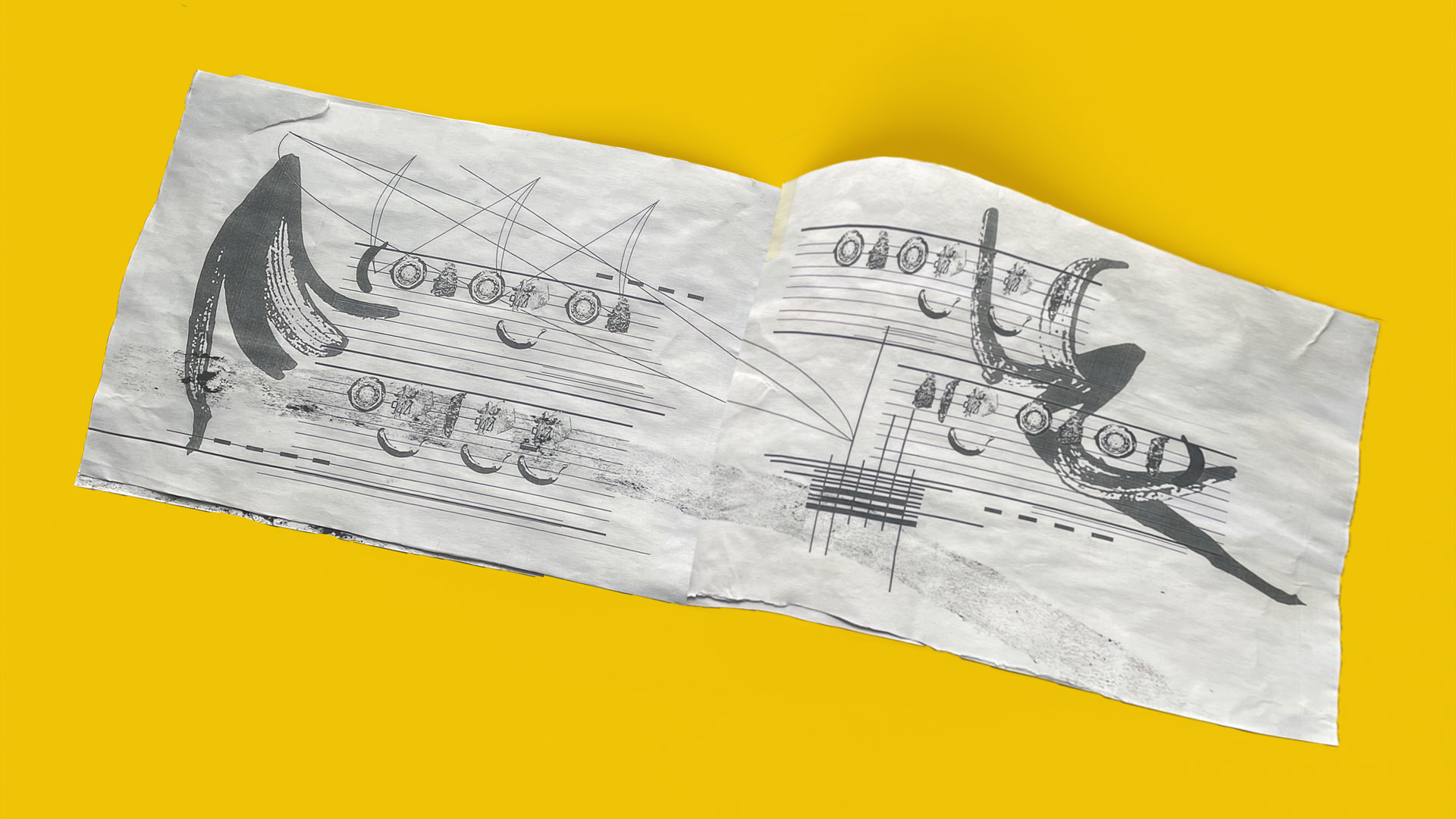 Insert from music book made up of found objects and bananas.